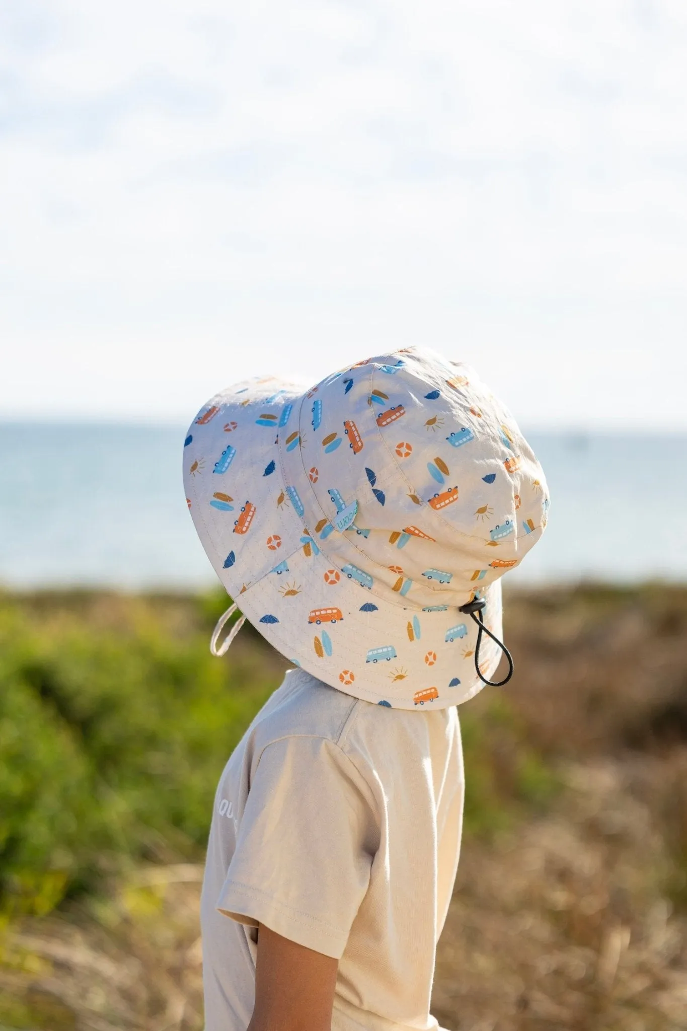 Sunrise Surf Wide Brim Bucket Hat